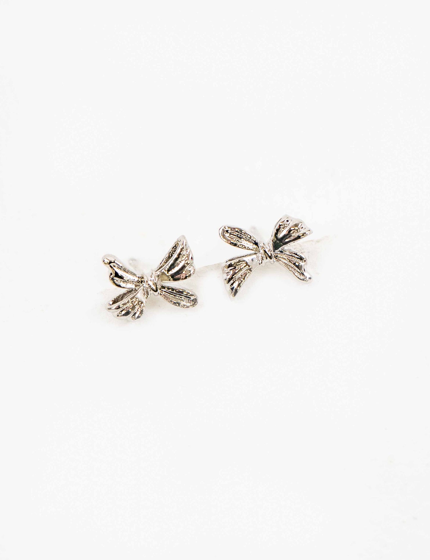 Ample Bow Charm Earrings | Silver