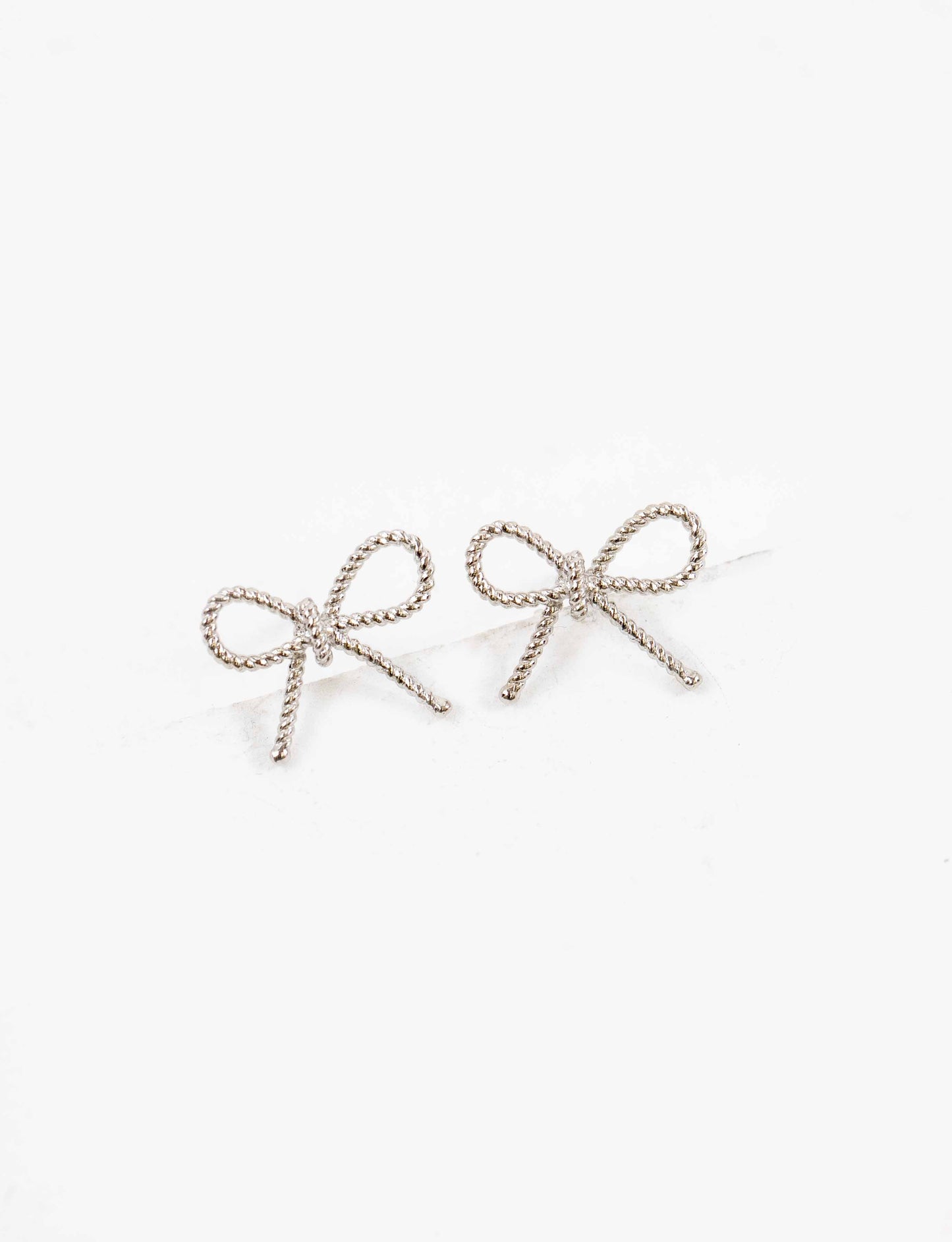 Ribbed Bow Charm Earrings | Silver