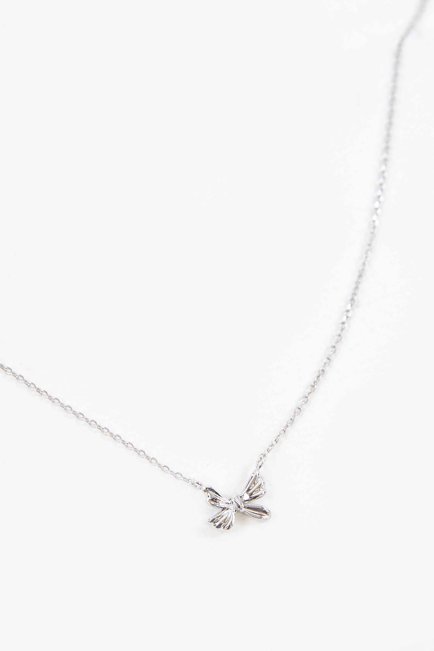 Ample Bow Charm Necklace | Silver