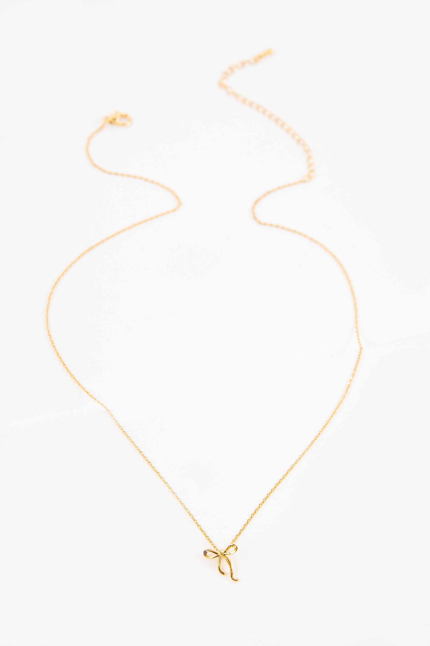 Curled Bow Charm Necklace | Gold