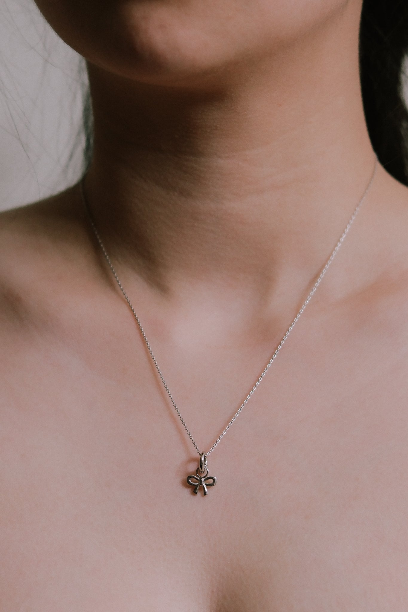 Small Bow Charm Necklace | Silver